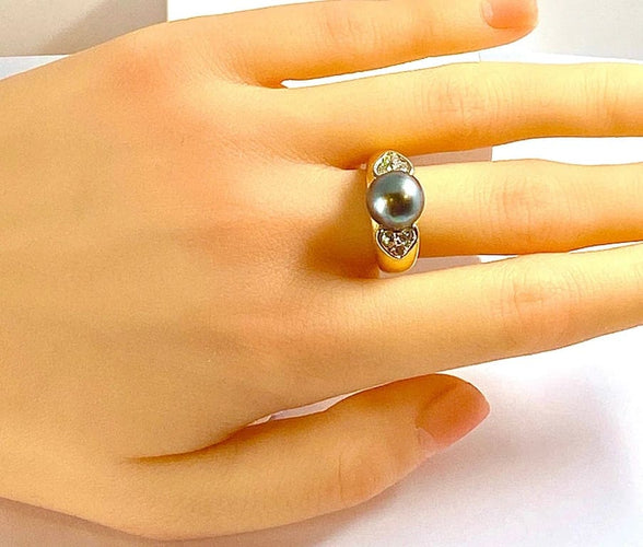 Bague 52 Bague en or jaune 18 carats avec perle de Tahiti et diamants 58 Facettes AB444