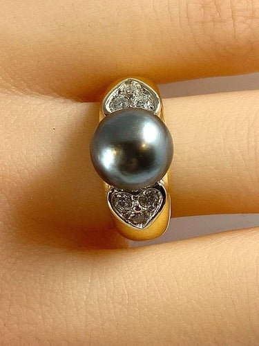 Bague 52 Bague en or jaune 18 carats avec perle de Tahiti et diamants 58 Facettes AB444