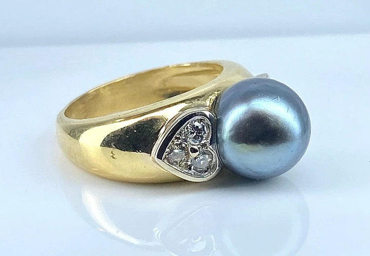 Bague 52 Bague en or jaune 18 carats avec perle de Tahiti et diamants 58 Facettes AB444