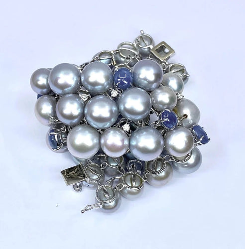 Bracelet Bracelet en or blanc 18 carats, saphirs étoilés, diamants et perles grises 58 Facettes AB632