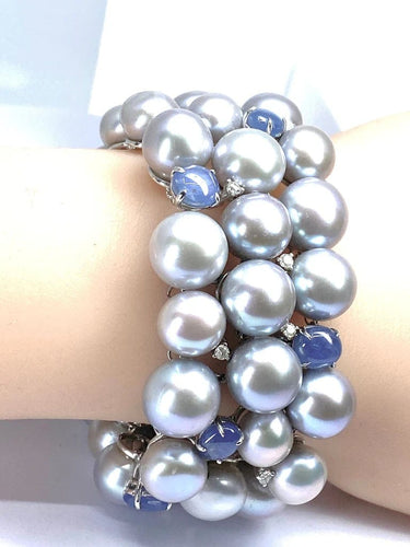 Bracelet Bracelet en or blanc 18 carats, saphirs étoilés, diamants et perles grises 58 Facettes AB632