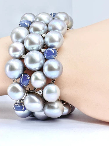 Bracelet Bracelet en or blanc 18 carats, saphirs étoilés, diamants et perles grises 58 Facettes AB632