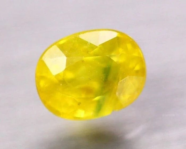 Gemstone Saphir jaune ovale chauffé 3,24 ct 58 Facettes 398
