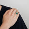 Bague 52 Bague en or blanc 18 kt avec émeraude et diamants 58 Facettes
