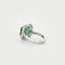 Bague 52 Bague en or blanc 18 kt avec émeraude et diamants 58 Facettes
