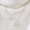 Collier Collier cœur en or blanc 750 serti de diamants 58 Facettes
