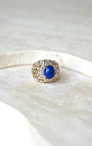 Bague 52 Bague cocktail en or jaune, lapis-lazuli et diamants 58 Facettes