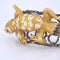 Bracelet Bracelet rigide motif gecko en or 18 carats, diamants et saphirs 58 Facettes BR113