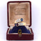 Bague 53 Bague vintage - Bypass en or 18 kt avec rubis, saphir et diamants 58 Facettes AN24 '(00019)