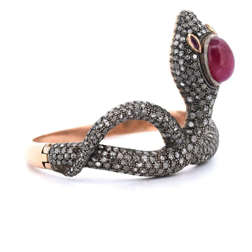 Bracelet Bracelet en or 14 carats et argent avec rubis et diamants 58 Facettes BR37