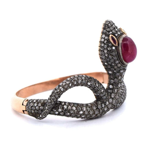 Bracelet Bracelet en or 14 carats et argent avec rubis et diamants 58 Facettes BR37