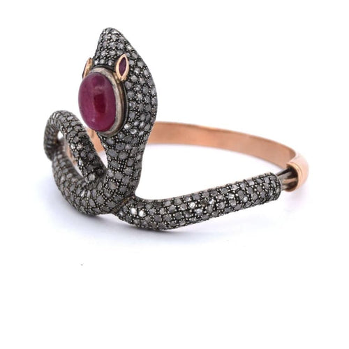 Bracelet Bracelet en or 14 carats et argent avec rubis et diamants 58 Facettes BR37