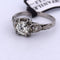 Bague 55 Bague antique en or blanc 18 carats et diamants 58 Facettes