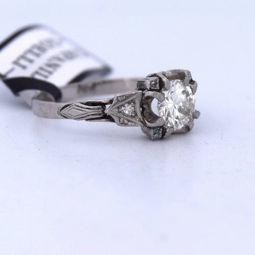 Bague 55 Bague antique en or blanc 18 carats et diamants 58 Facettes