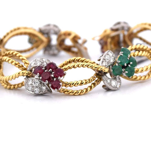 Bracelet Bracelet vintage en or jaune 18 carats avec diamants et pierres de couleur 58 Facettes BR100