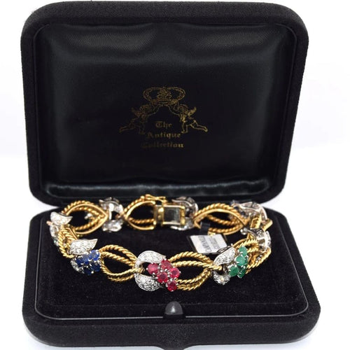 Bracelet Bracelet vintage en or jaune 18 carats avec diamants et pierres de couleur 58 Facettes BR100