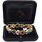 Bracelet Bracelet vintage en or jaune 18 carats avec diamants et pierres de couleur 58 Facettes BR100