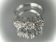 Bague 60 Bague trio de fleurs en or blanc 18 carats et diamants 58 Facettes