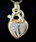 Collier Collier cœur cadenas en or tricolore serti de 1,50 ct de diamants 58 Facettes