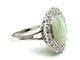 Bague Bague vintage en or blanc 18K avec opale et diamants 58 Facettes