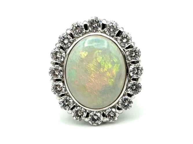 Bague Bague vintage en or blanc 18K avec opale et diamants 58 Facettes