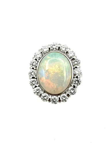 Bague Bague vintage en or blanc 18K avec opale et diamants 58 Facettes