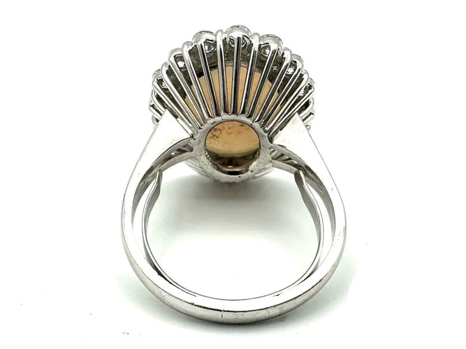 Bague Bague vintage en or blanc 18K avec opale et diamants 58 Facettes