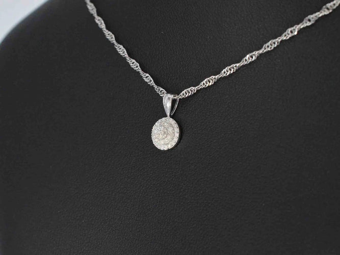 Pendentif Pendentif en or blanc et diamants 58 Facettes 2026