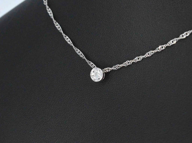 Pendentif Pendentif en or blanc avec diamant taille brillant 58 Facettes 2089