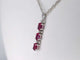 Pendentif Pendentif en or blanc 14 carats avec diamants et rubis 58 Facettes 2138