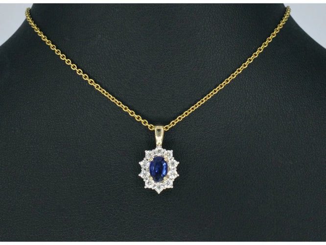 Pendentif Pendentif entourage en or jaune 14 carats, saphir et diamants 58 Facettes 2300