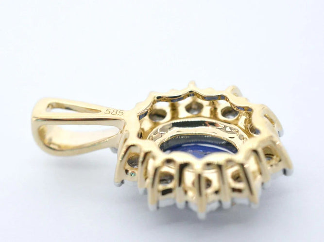 Pendentif Pendentif entourage en or jaune avec diamants et saphir 58 Facettes 2300