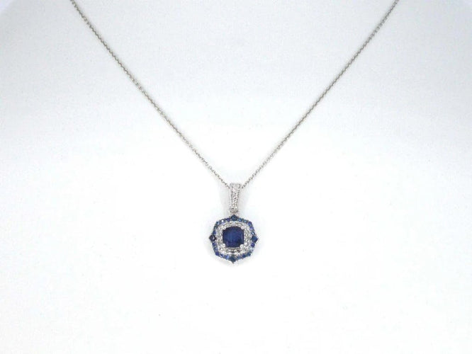 Pendentif Pendentif en or blanc 14 carats avec diamants et saphir 58 Facettes 2351