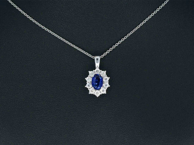 Pendentif Pendentif en or blanc 14 carats avec diamants et saphir 58 Facettes 2299