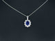 Pendentif Pendentif en or blanc 14 carats avec diamants et saphir 58 Facettes 2299