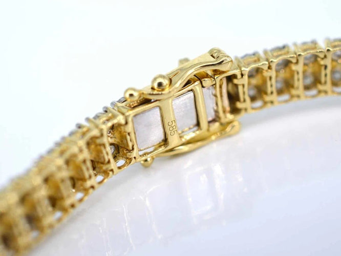Bracelet Bracelet tennis en or 14 carats à diamants 1,50 ct 58 Facettes 2148
