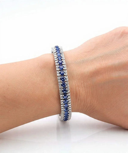 Bracelet Bracelet tennis - Bracelet en or blanc 18 carats, saphirs et diamants 58 Facettes