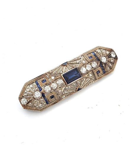 Broche Broche années 1940 en or blanc 18 carats, saphirs et diamants 58 Facettes