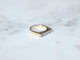 Bague 52 Bague Jarretière Art Déco en or jaune et blanc 18 kt, diamants 58 Facettes