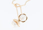 Boucles d'oreilles Cacharel - Parure collier et boucles d’oreilles en or jaune 18 carats et perles 58 Facettes