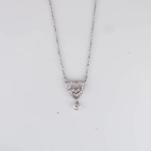 Collier Collier pendentif cœurs entrelacés en or blanc 18 ct et diamants 58 Facettes 1
