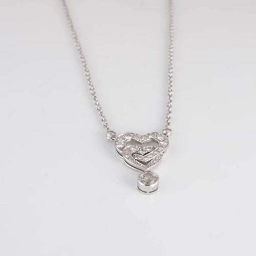 Collier Collier pendentif cœurs entrelacés en or blanc 18 ct et diamants 58 Facettes 1