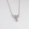 Collier Collier pendentif cœurs entrelacés en or blanc 18 ct et diamants 58 Facettes 1