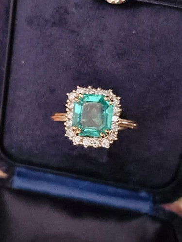 Bague Bague halo en or jaune 18 carats avec émeraude colombienne et diamants 58 Facettes