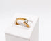 Bague 51 Alliance demi-lune croisée en or jaune 18 carats avec diamant 58 Facettes 240019