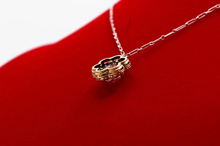Collier Collier marguerite en or jaune, platine, diamant et rubis 58 Facettes 240285