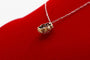 Collier Collier marguerite en or jaune, platine, diamant et rubis 58 Facettes 240285