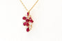Pendentif Pendentif en or jaune 750 avec rubis et diamants 58 Facettes 250293