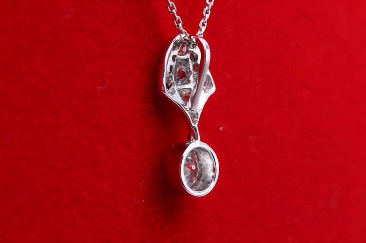 Pendentif Pendentif en platine avec diamants, vers 1925 58 Facettes 240658