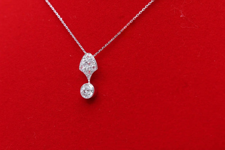 Pendentif Pendentif en platine avec diamants, vers 1925 58 Facettes 240658